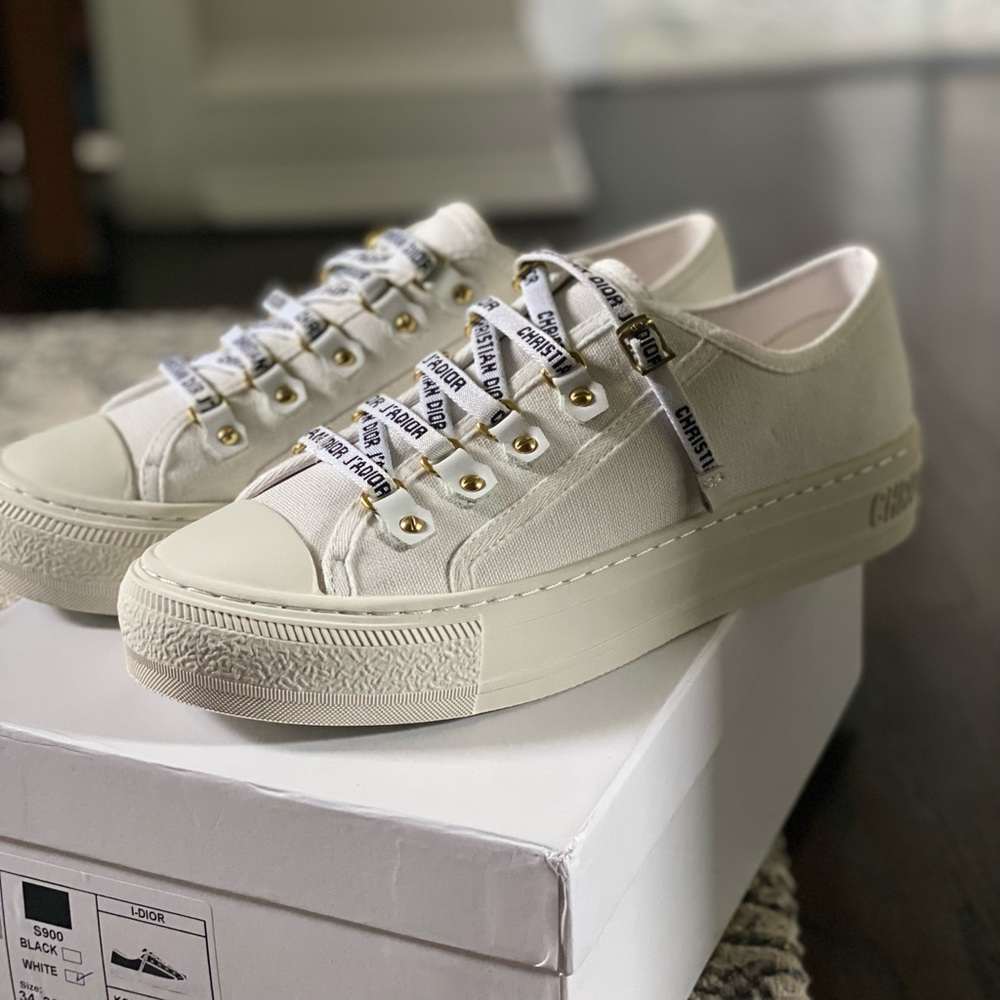 Christian J’Adior white fabric sneakers .
